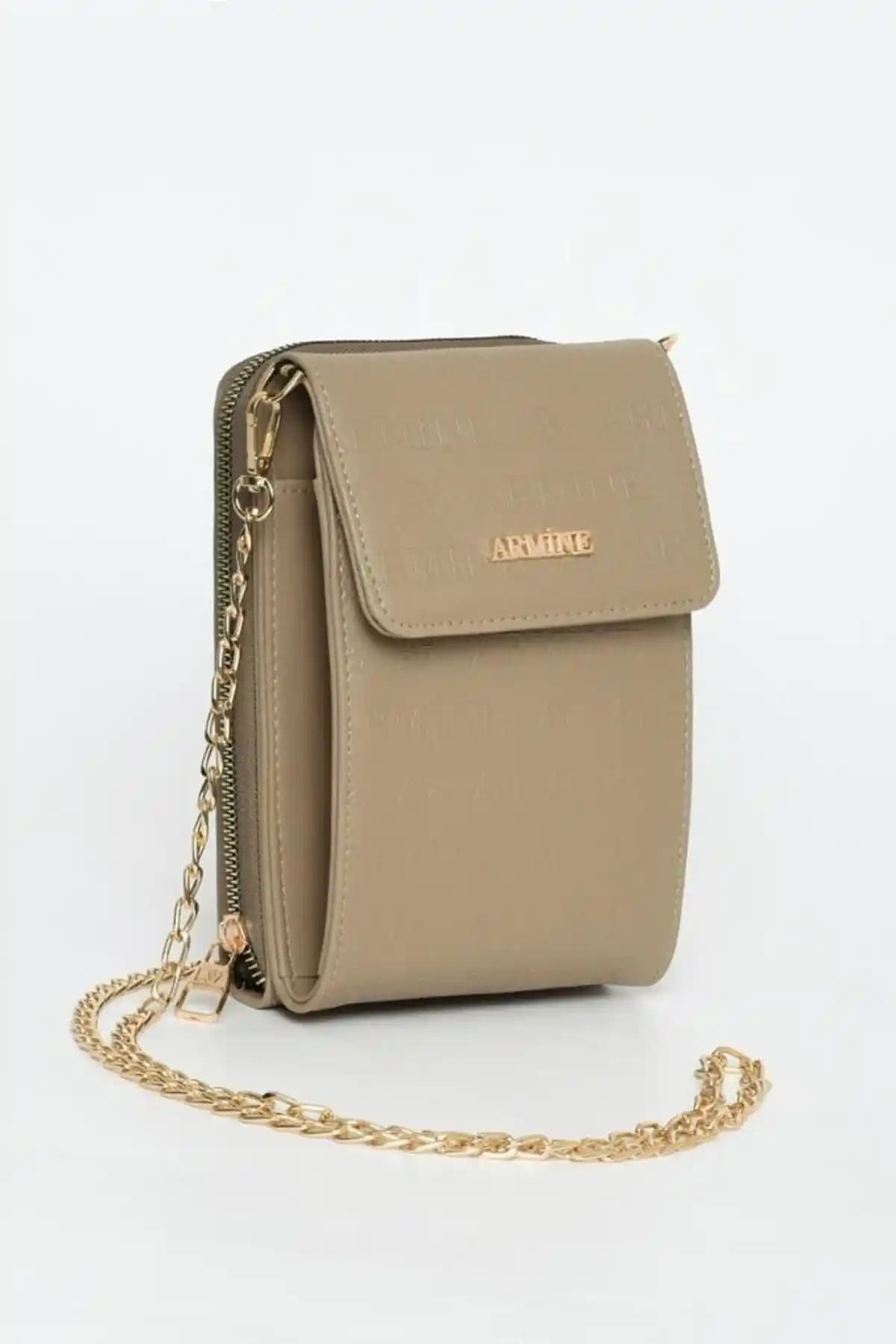 Armine Vizon Lazer Çanta: Şıklık ve Fonksiyonelliğin Modern Buluşması