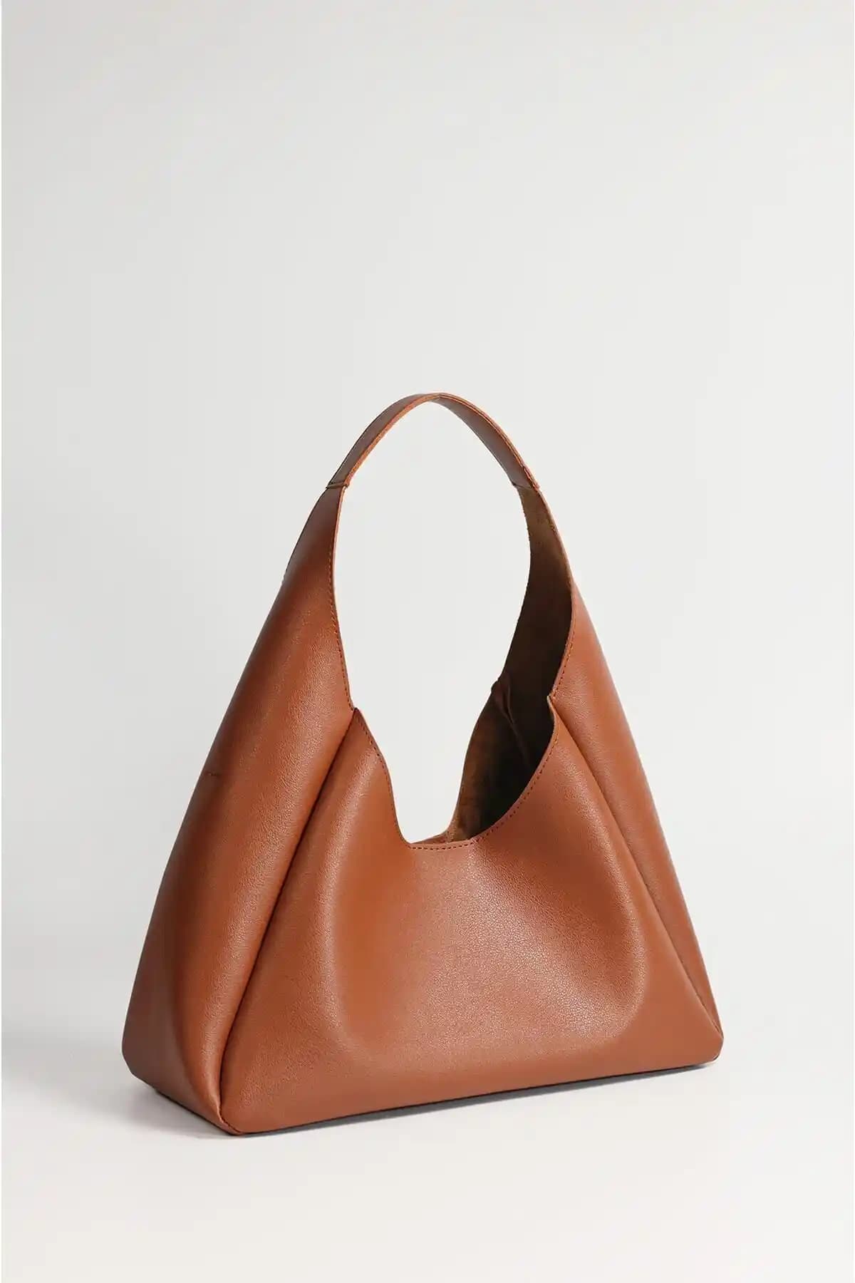 DENSİLA Kadın Taba Suni Deri Fermuarlı İç Bölmeli El ve Omuz Çantası Özellikleri ve Kullanım Alanları