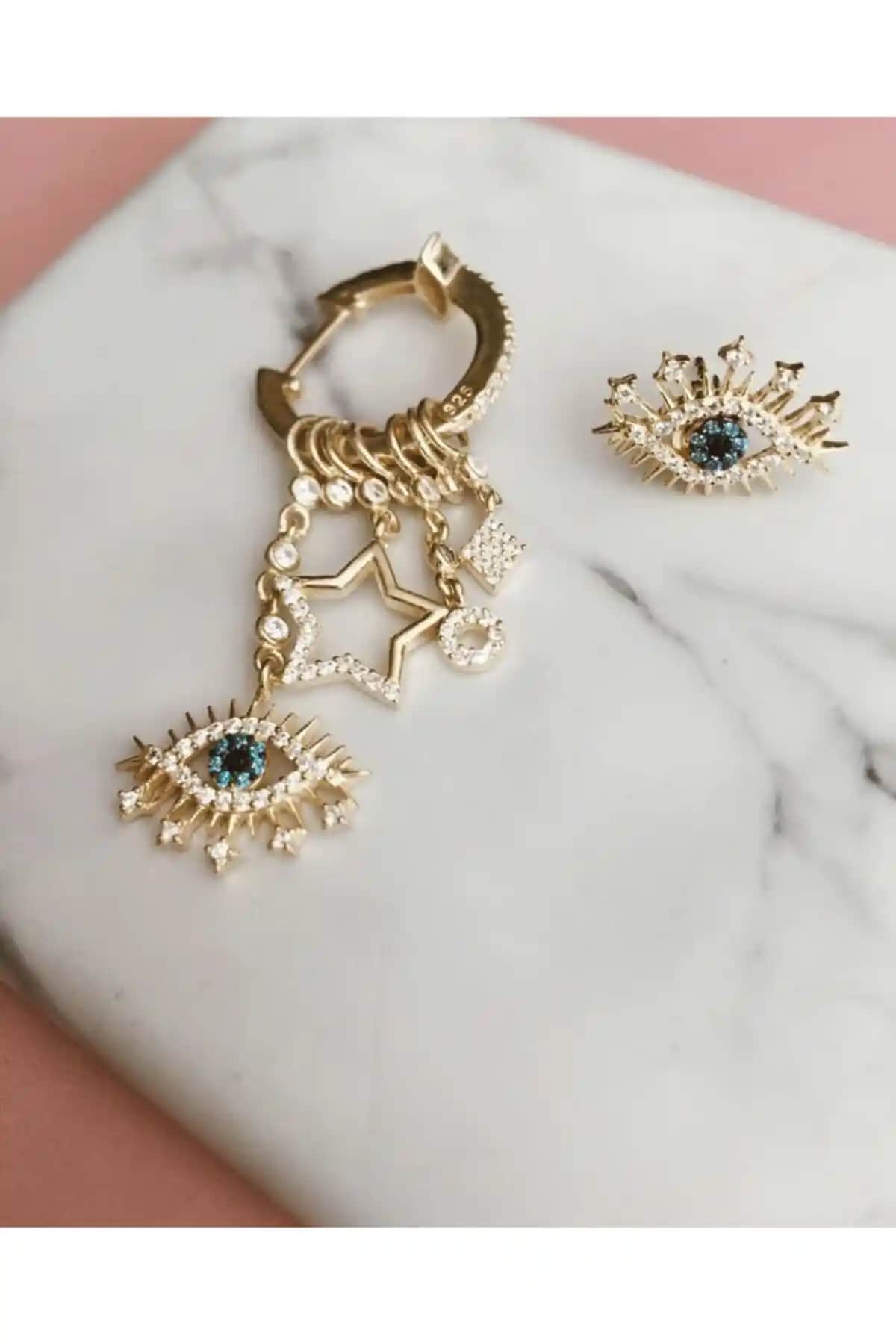 Gülşah Sezer Çoklu Sallantılı Göz Kan Gümiş Gümüş Küpe Modern ve Zarif Tasarım