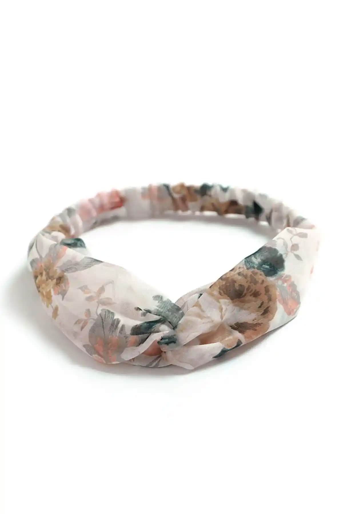 Kadınlar İçin Şık ve Rahat Bej Renkli Çiçek Desenli Saç Bandı Ürün Tanıtımı ve Özellikleri