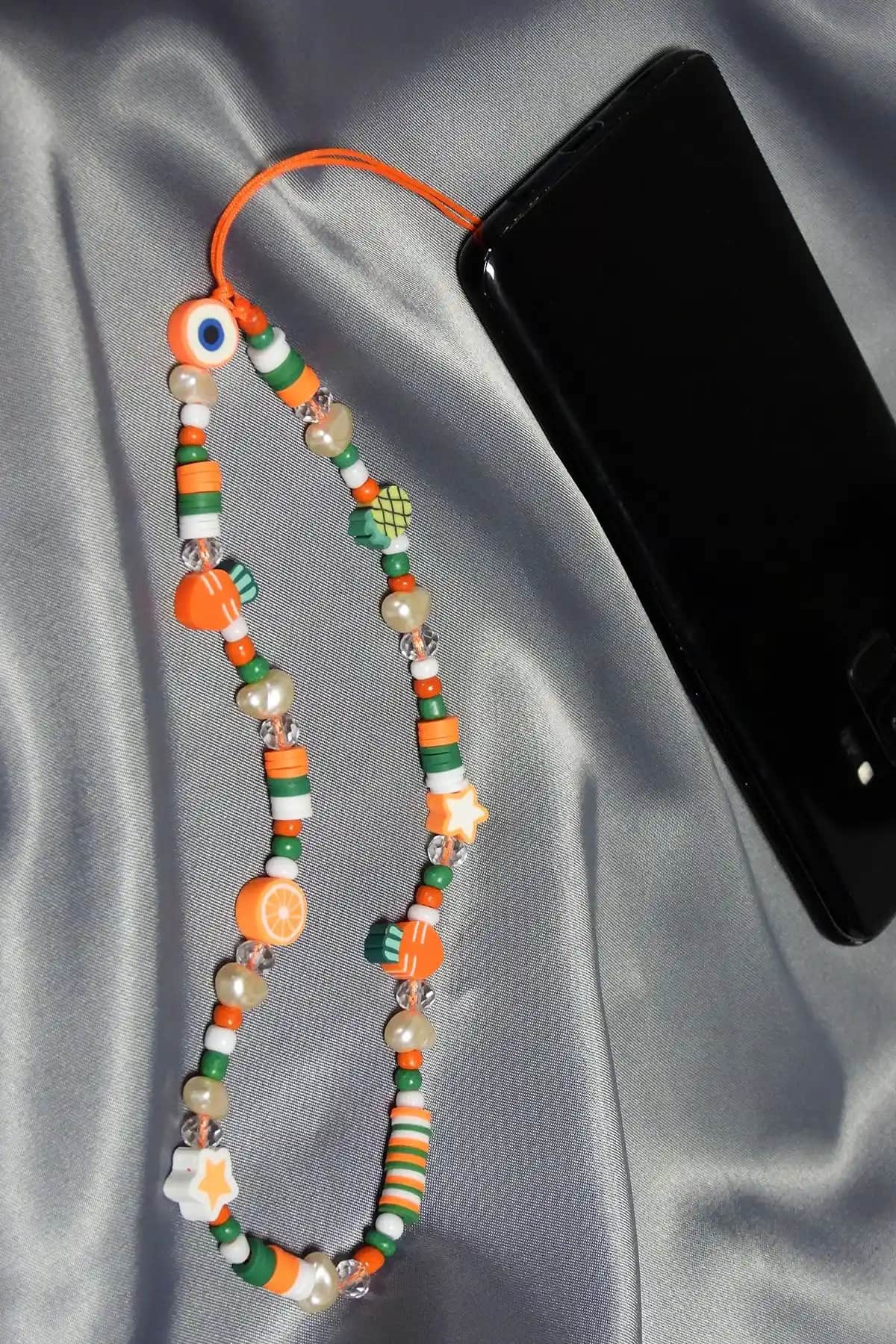 Karlay Turuncu Renkli Boncuk Silikon Telefon İpi: Şık ve Kullanışlı Telefon Aksesuarı