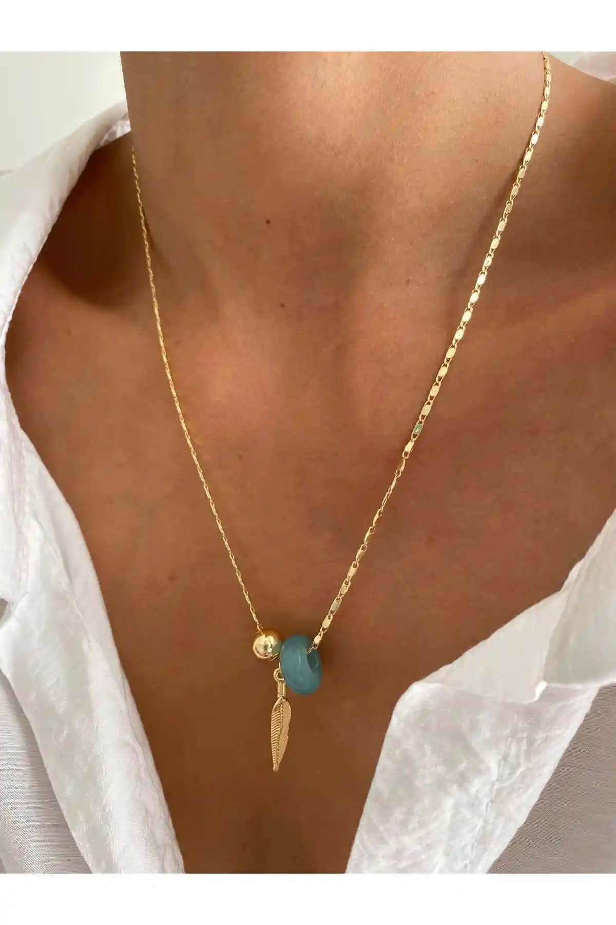 MagicStone Kedi Gözü Hareketli Uçlu Kolye: Zarif ve Parlak Tasarım ile Göz Kamaştırıcı Aksesuar