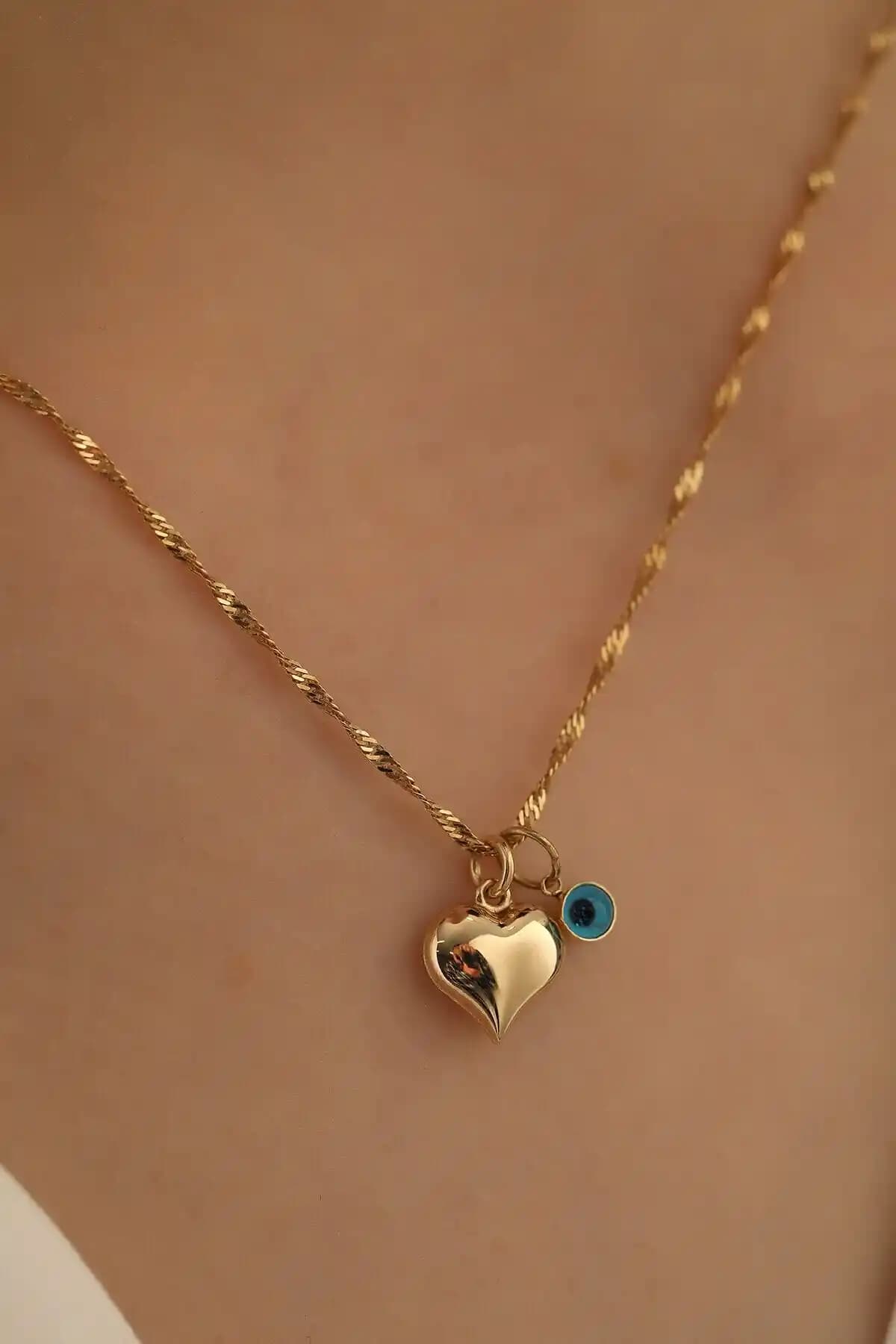 Milet Kuyumculuk 14 Ayar Altın Kalp Göz Singapur Zincir Kolye Özellikleri ve Tasarımı