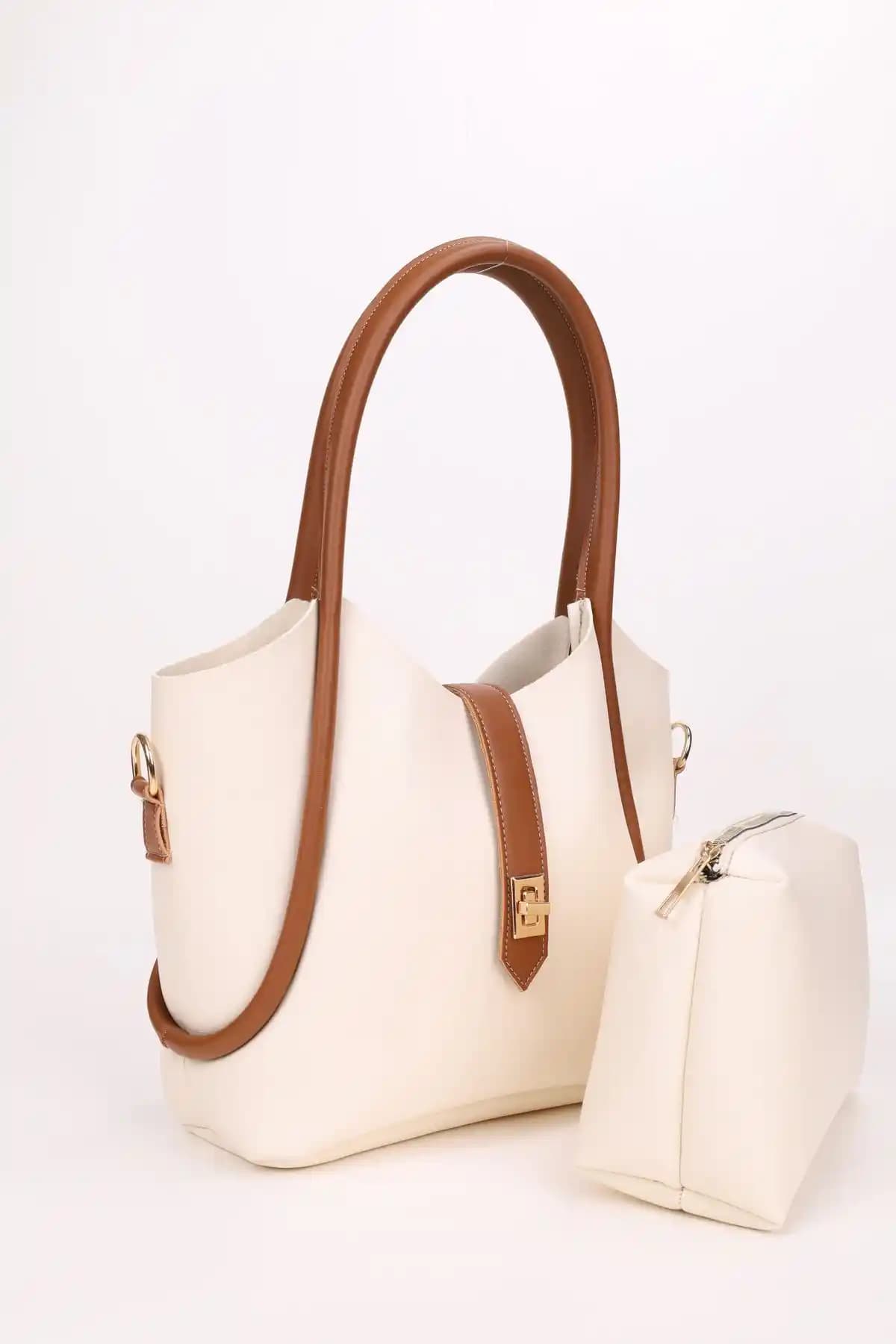 Nothing Krem Taba Kilit Detaylı Çok Fonksiyonlu Kadın Çantası En Güncel Tasarım ve Kullanım Özellikleri