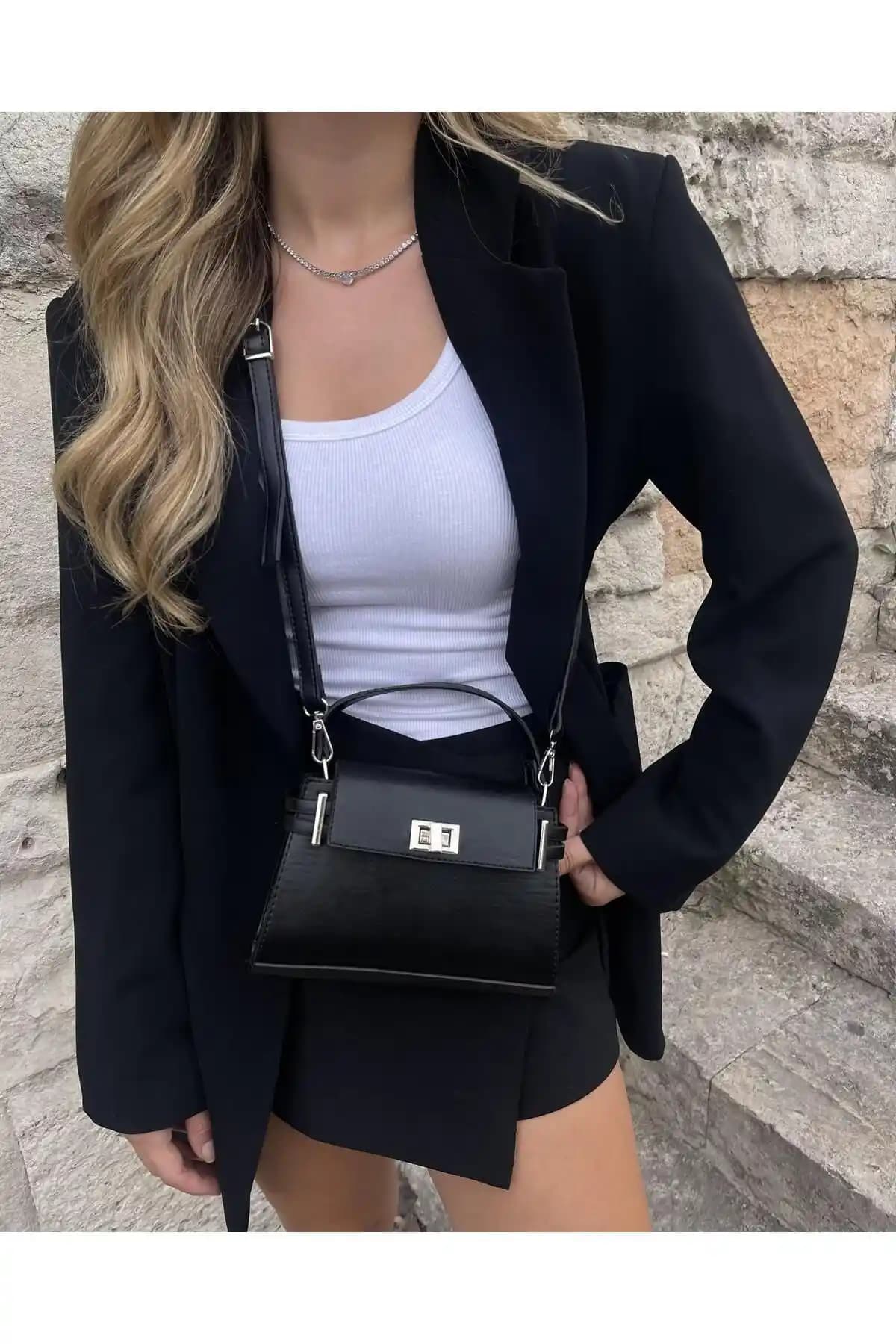 Tina Kilit Kapaklı Siyah Kol Çantası Günlük Kullanım İçin Şık ve Dayanıklı Tasarım