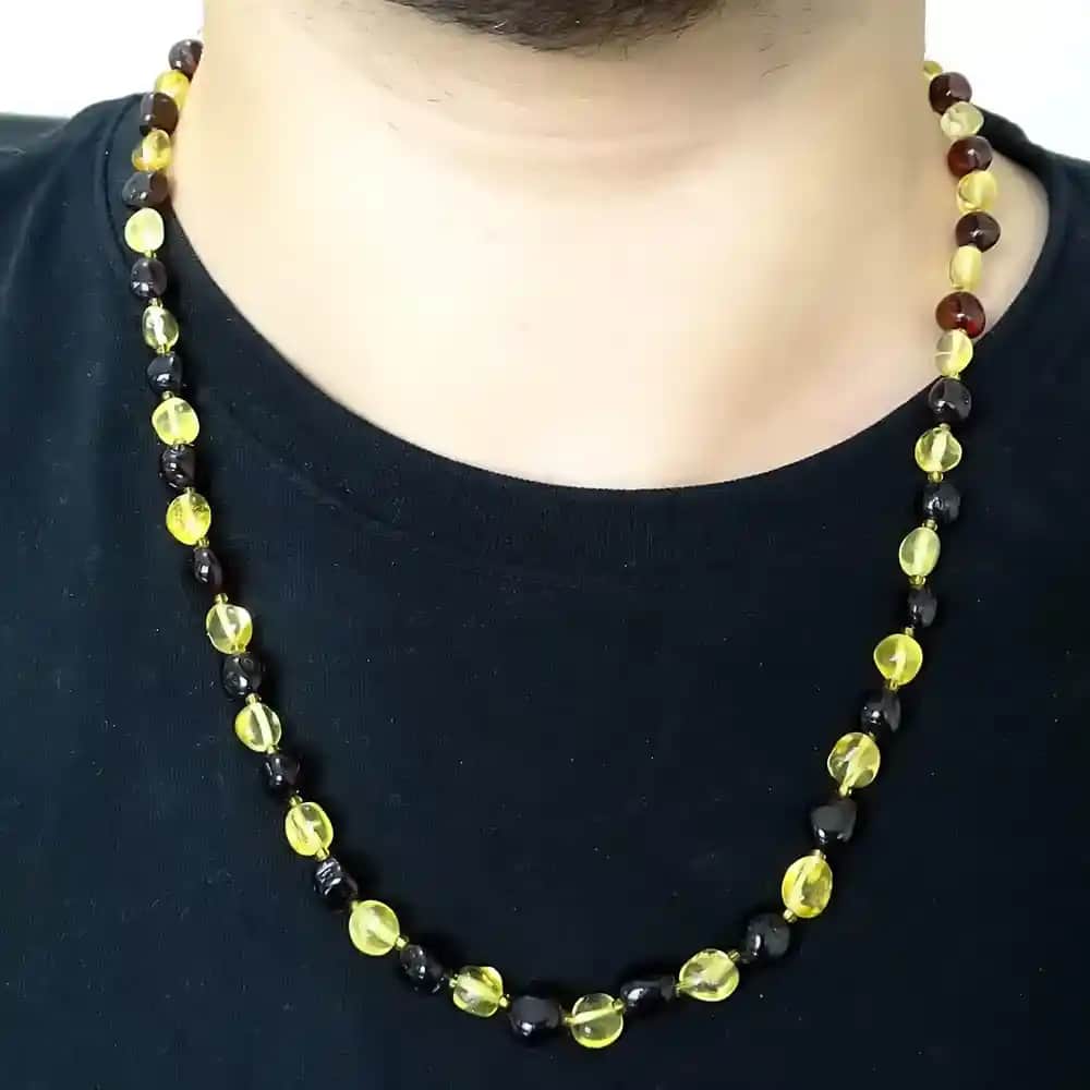 Damla Kehribar Kolye: Estetik ve Spiritüel Değerleriyle Benzersiz Takı Seçenekleri