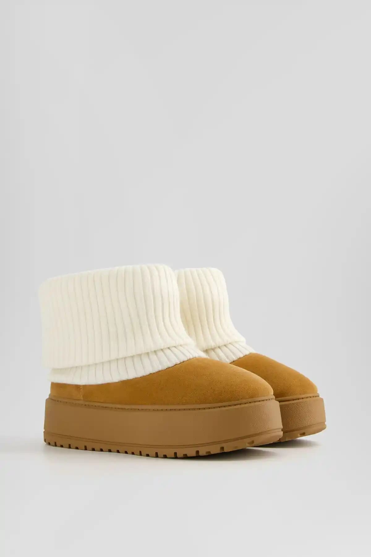 Bershka Platform Bilekte Bot: Şıklık ve Konforu Bir Arada Sunan Kış Ayakkabısı