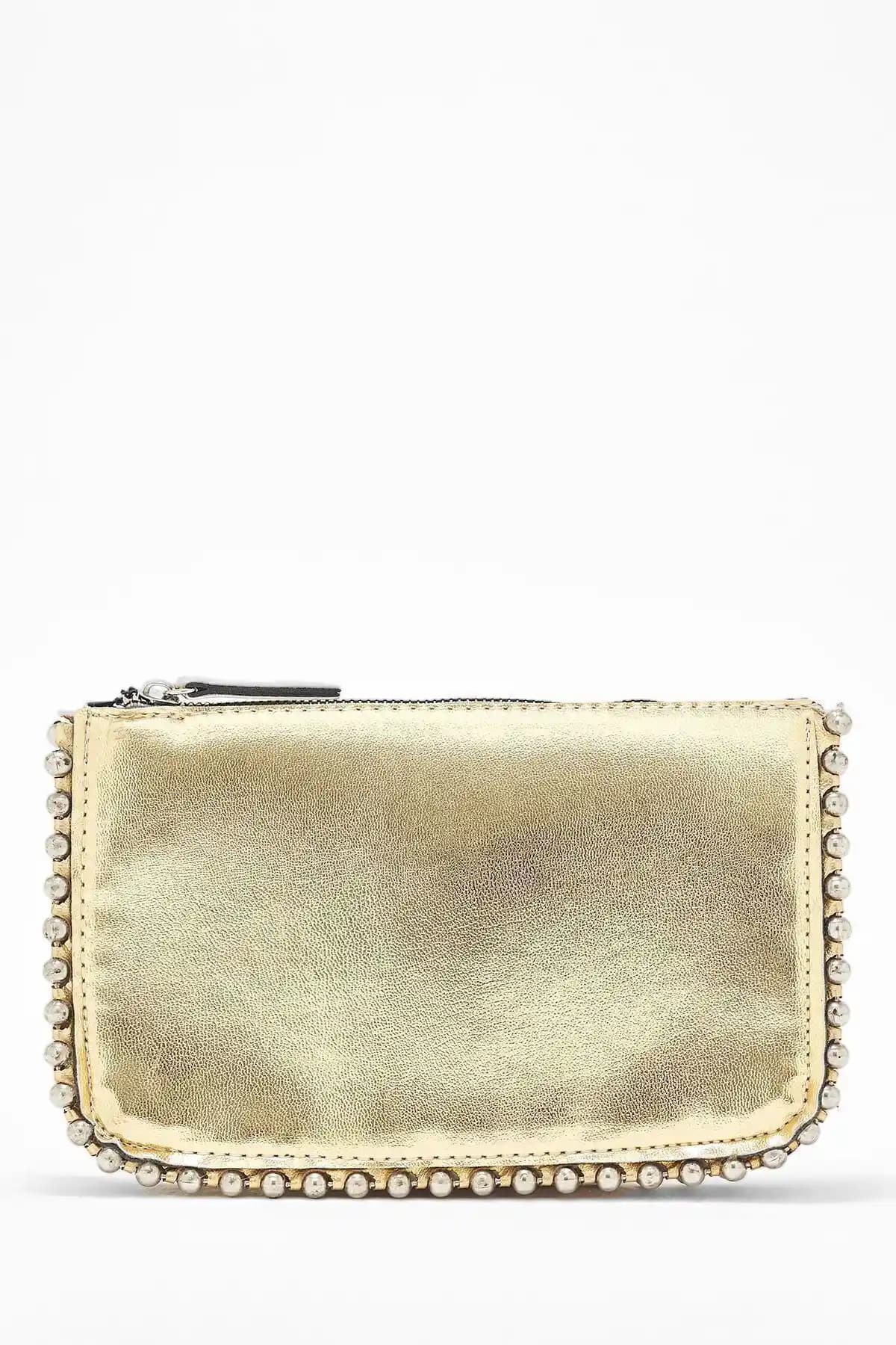 Kadınlar İçin Modern ve Şık Zımbalı Askılı Çanta Özellikleri ve Kullanım İpuçları