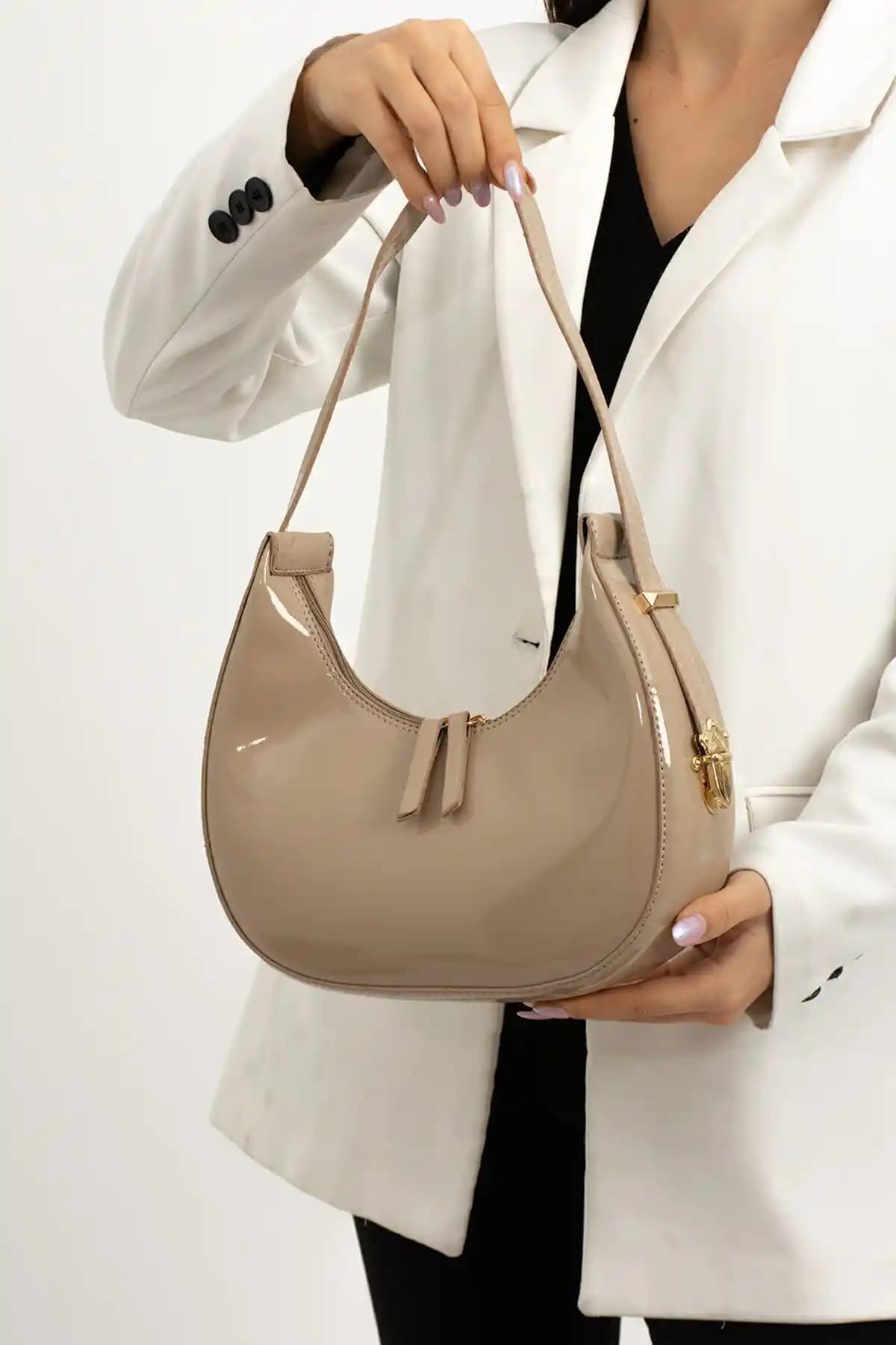 İAMBTŞY ve Mybag Kadın Rugan Çanta Karşılaştırması: Özellikler ve Kullanıcı Yorumları