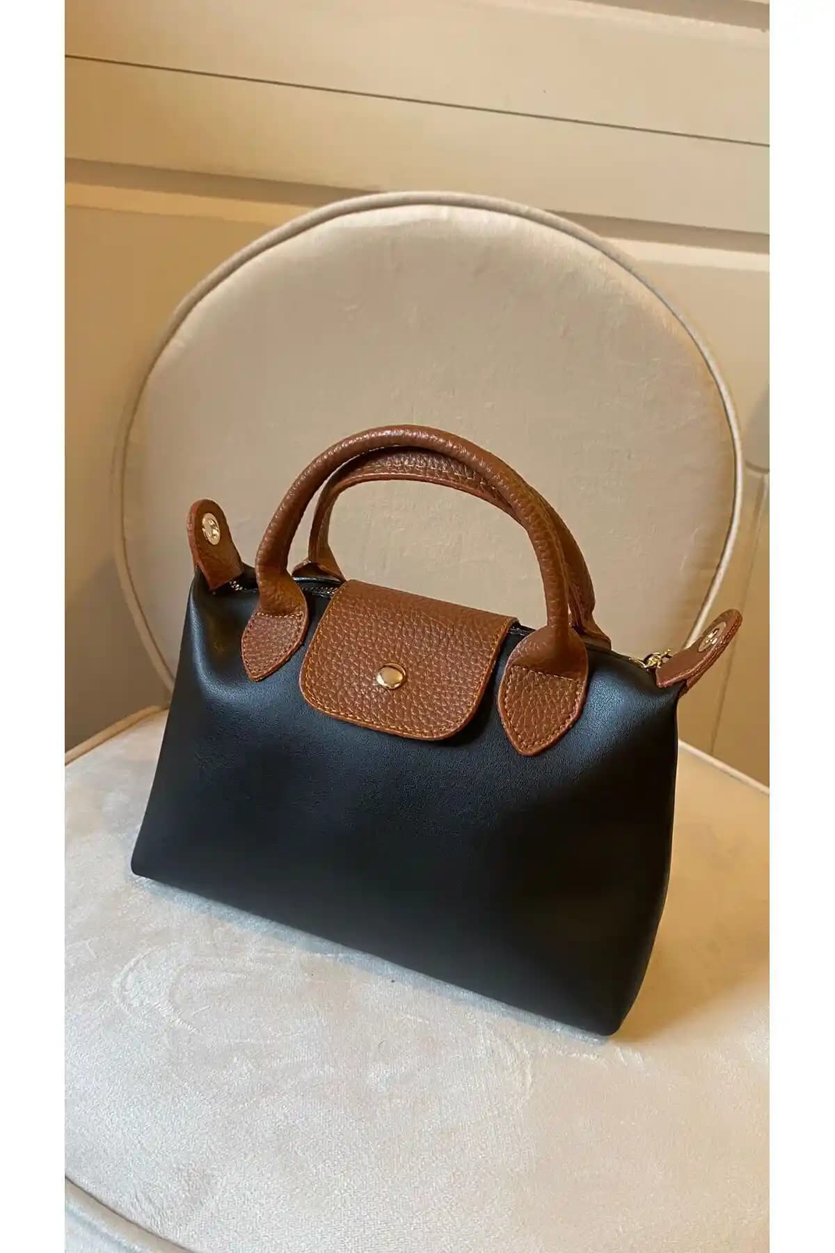 Mercan Stores Kadın Fermuar ve Çıt Çıt Kapamalı El ve Omuz Çantası Özellikleri ve Kullanım İpuçları