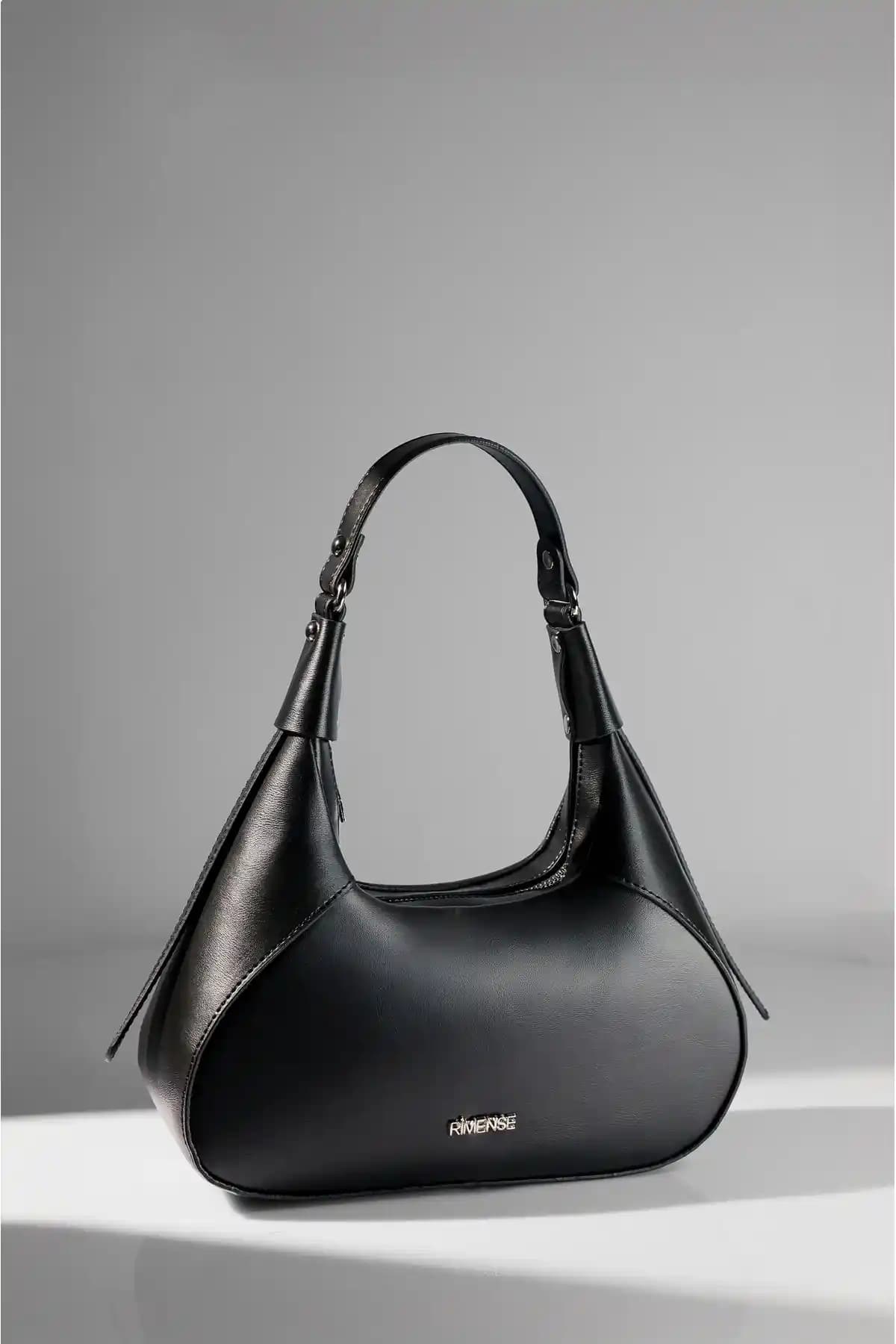 Rimense Siyah El Çantası ve Shaka Bordo ŞK110 Çanta Karşılaştırması