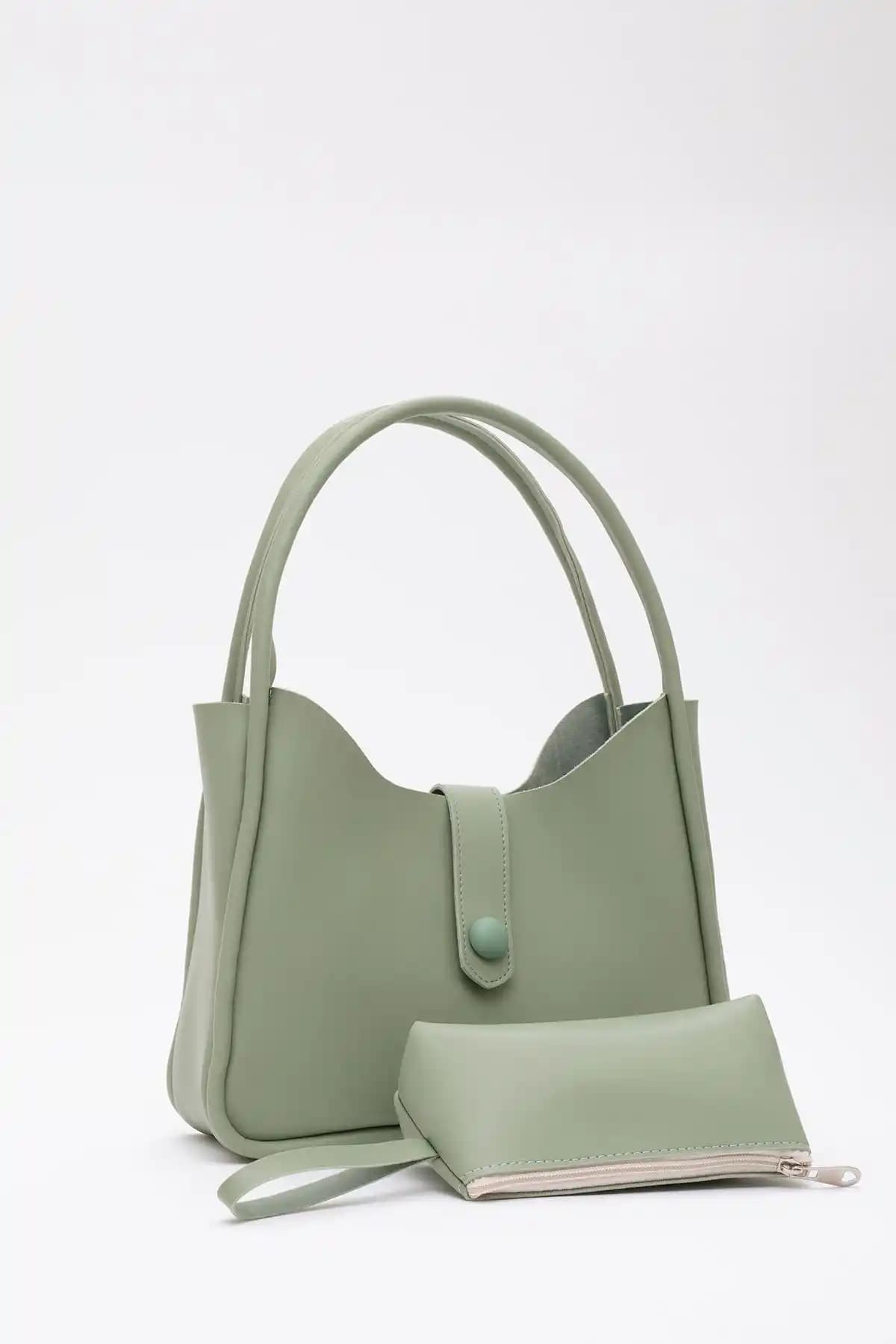 Şaka Mint Yeşil Deri Düğme Detaylı Çıtçıtlı Makyaj Çantasını Keşfedin