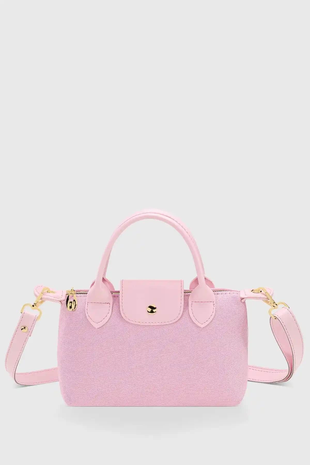 Housebags Pembe Kanvas ve Modstore Miny City Kadın Çantası Karşılaştırması