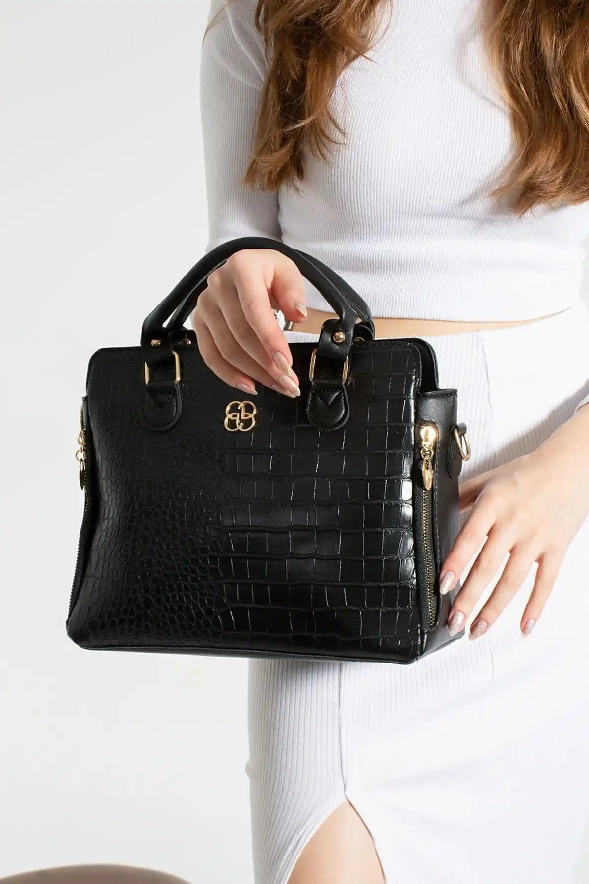 Rosmod Kadın Siyah Croco Deri ve Venüs Desenli Çanta Karşılaştırması