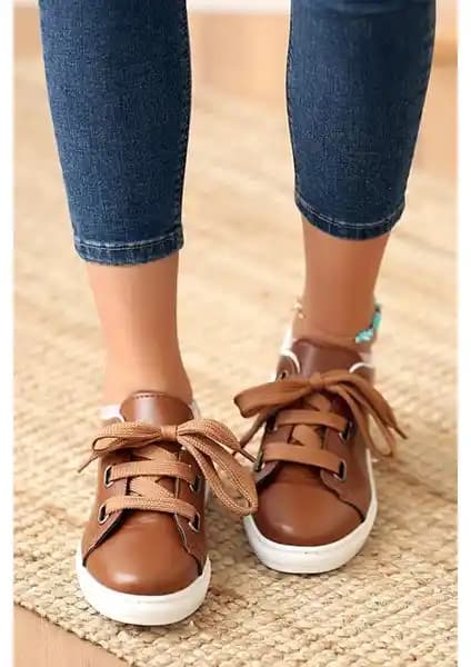 Pembe Potin Kadın Spor Ayakkabısı Rahatlık ve Şıklığı Bir Arada Sunar