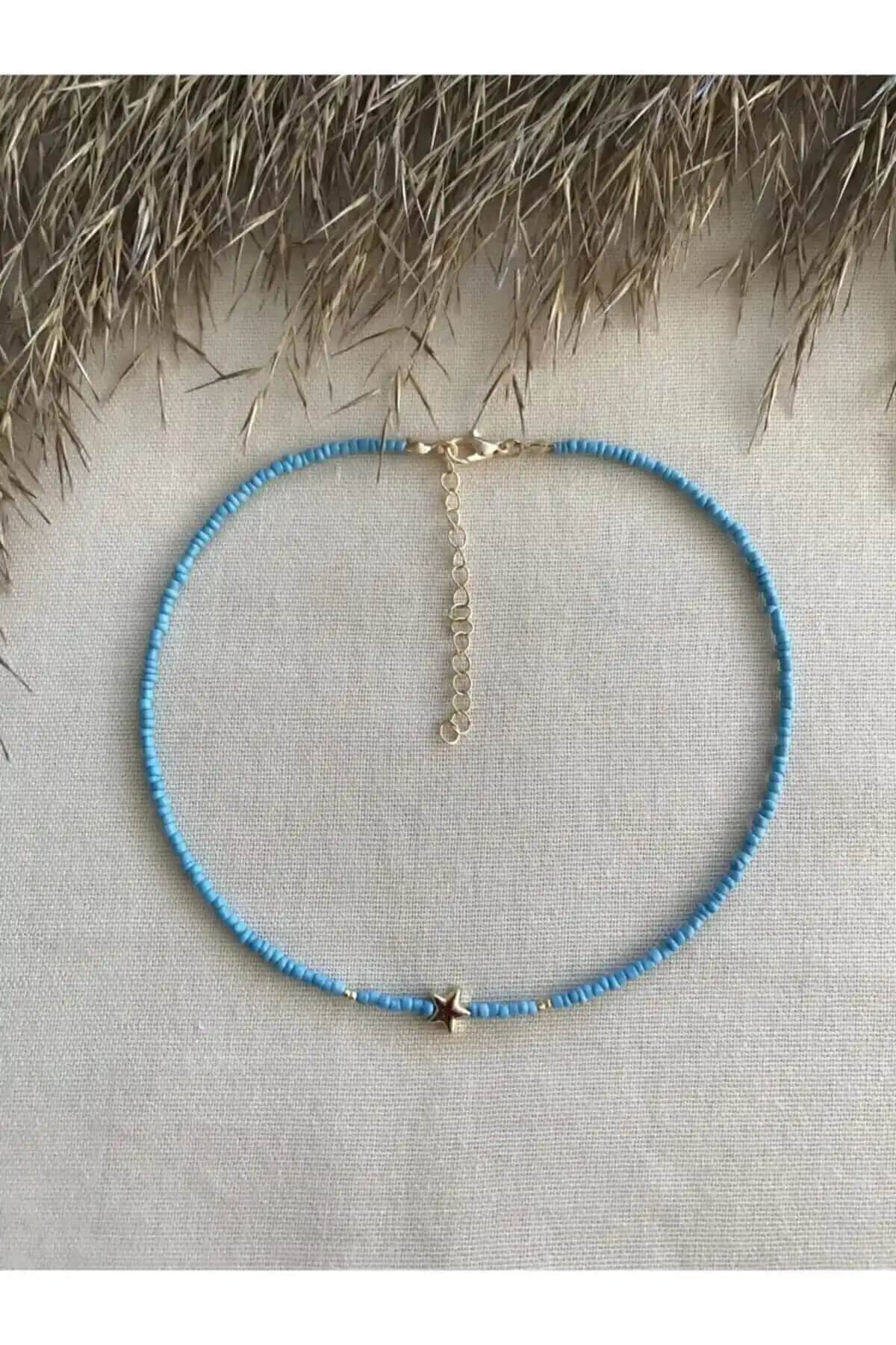 Esen Aksesuar Mavi Boncuklu Kolye ile HERCY Beyaz Kalpli Boncuklu Kolye Karşılaştırması