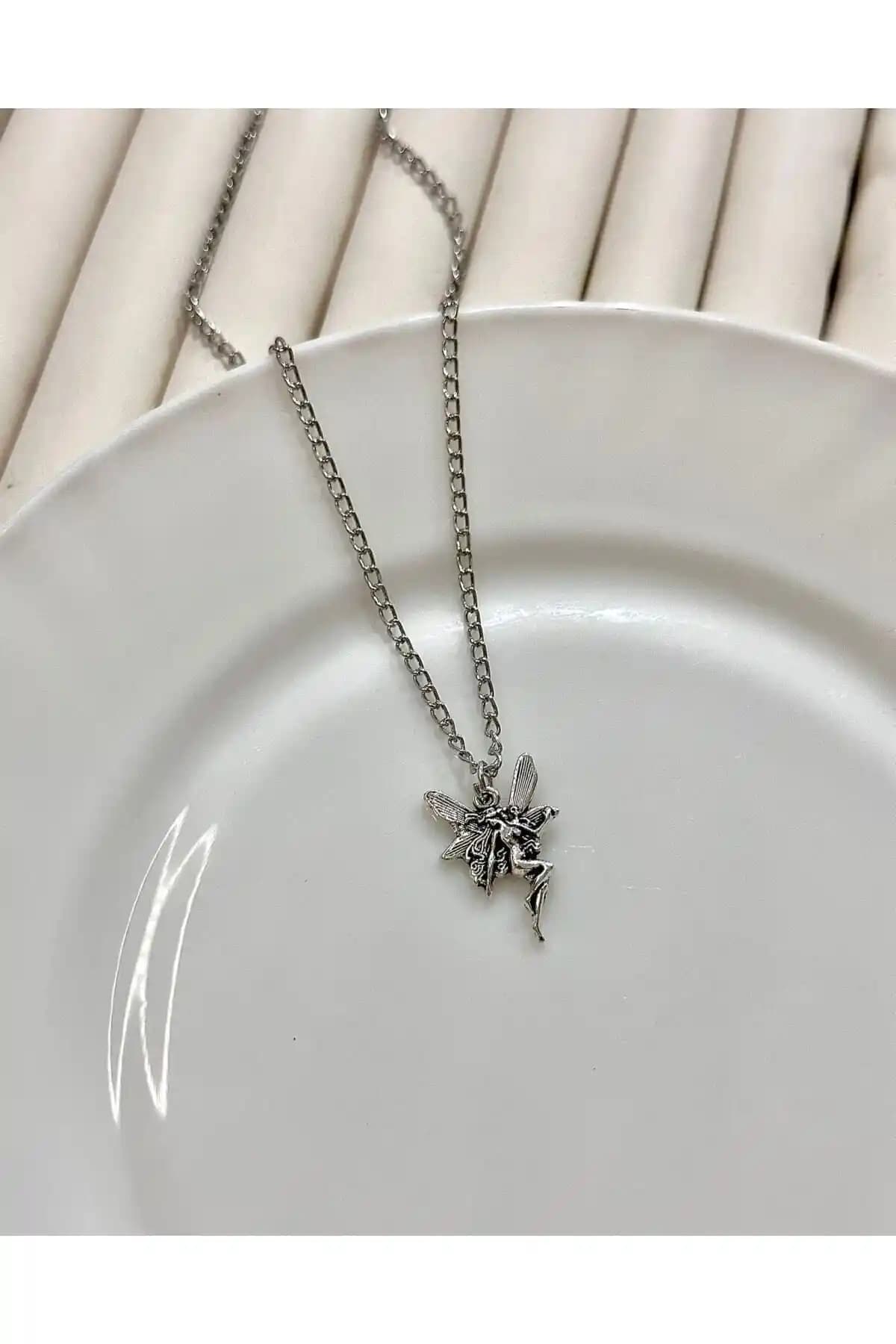 Sleyshop Minimal Peri ve Yıl<dı>z Örümcek Kolye Karşılaştırması: Tasarım ve Kullanım Özellikleri