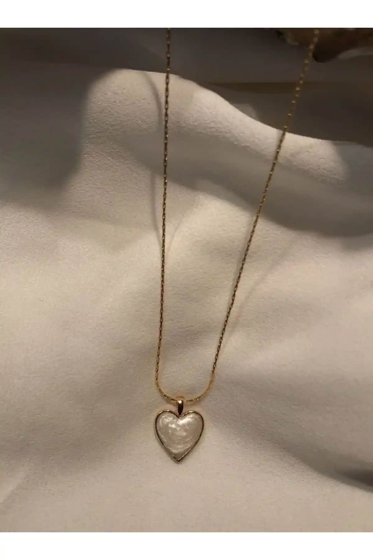 Fiamoss Sedefli Kalp Kolye ve Mercy Yıldız Plaka Kolye Karşılaştırması