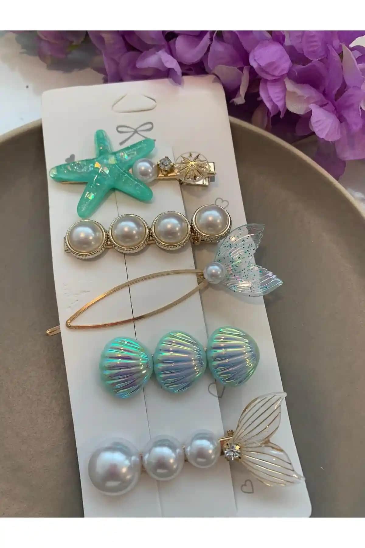 Pelin Aksesuar 5'li Deniz Yıldızı ve 6'lı Yeşil Çiçekli Toka Setleri Karşılaştırması