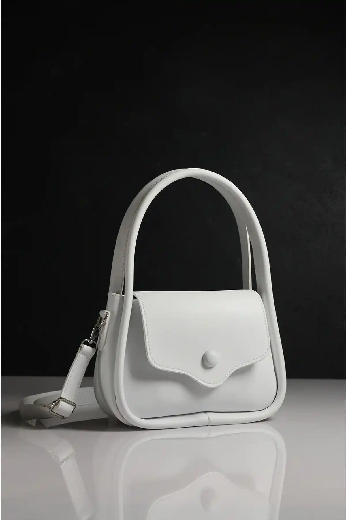 Rimense Marka Çanta Karşılaştırması: Beyaz Omuz ve Siyah Keten Modelleri Analizi