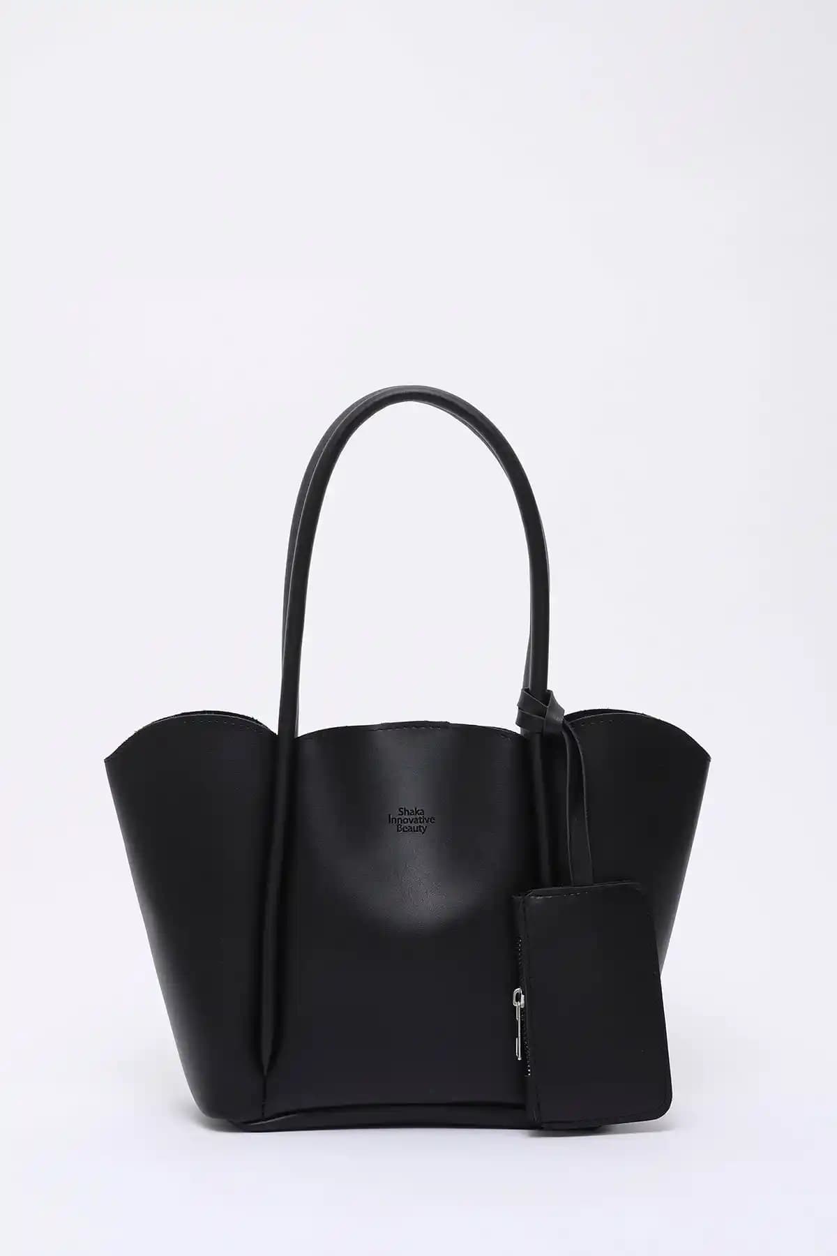 Shaka Siyah Çanta ve Cüzdanı Karşılaştırması: Tasarım ve Kullanışlılık Analizi