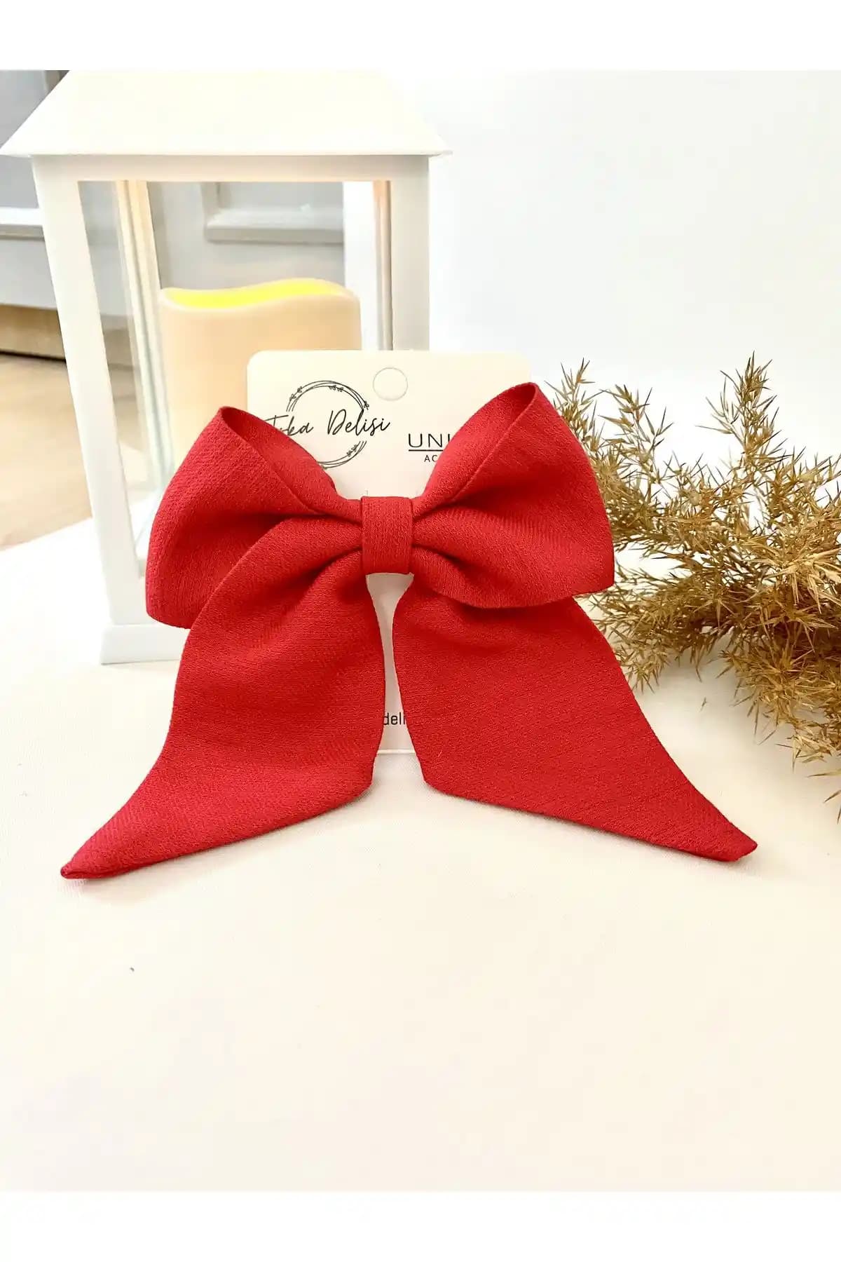 Toka Delisi Kırmızı ve UniqueHandMade Siyah Otomatik Fiyonk Tokaları Karşılaştırması