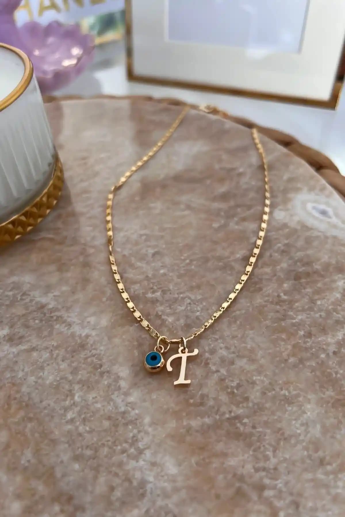 Trendy Butik'in Nazar Kolye Modelleri: Altın Kaplama ve Beyaz Mineli Tasarımlar