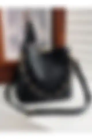Pemboo Kadın Zincir Aksesuarlı Yumuşak Deri Çanta İncelemesi ve Özellikleri